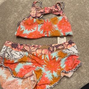 Maaji halter top and boy short swim bottoms.